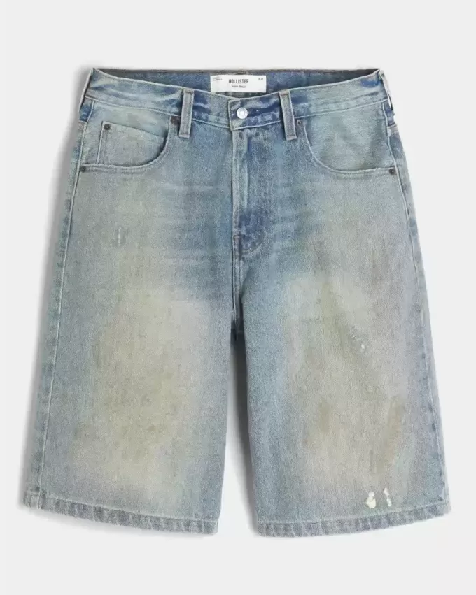 Pantaloncini in denim super larghi con lavaggio medio ingrassato