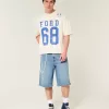 Pantaloncini in denim super larghi con lavaggio medio sotto il ginocchio