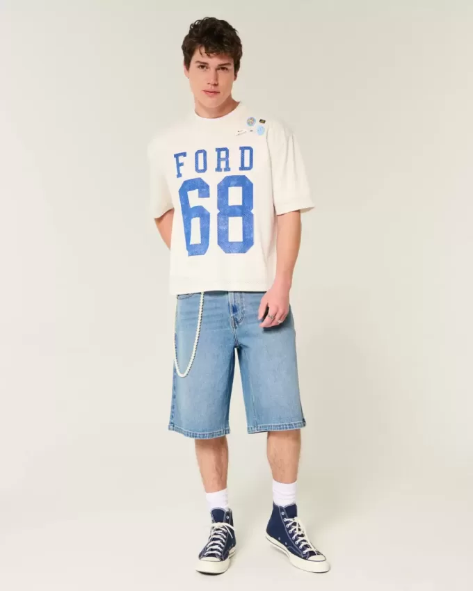 Pantaloncini in denim super larghi con lavaggio medio sotto il ginocchio