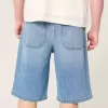 Pantaloncini in denim super larghi con lavaggio medio sotto il ginocchio