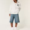 Pantaloncini in denim super larghi lavaggio scuro sotto il ginocchio