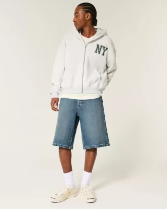 Pantaloncini in denim super larghi lavaggio scuro sotto il ginocchio