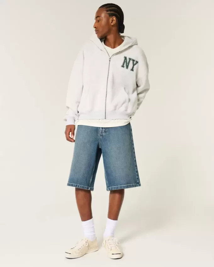 Pantaloncini in denim super larghi lavaggio scuro sotto il ginocchio