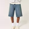 Pantaloncini in denim super larghi lavaggio scuro sotto il ginocchio