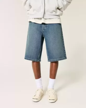Pantaloncini in denim super larghi lavaggio scuro sotto il ginocchio