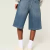 Pantaloncini in denim super larghi lavaggio scuro sotto il ginocchio