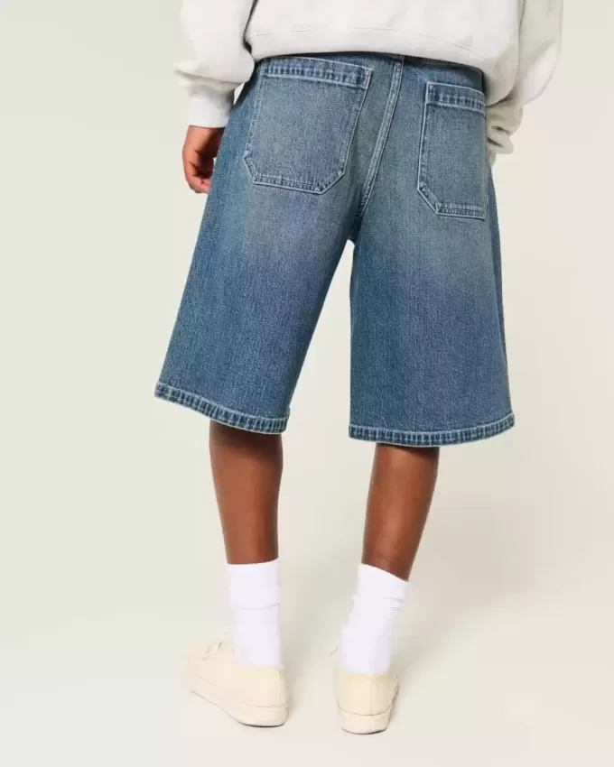 Pantaloncini in denim super larghi lavaggio scuro sotto il ginocchio