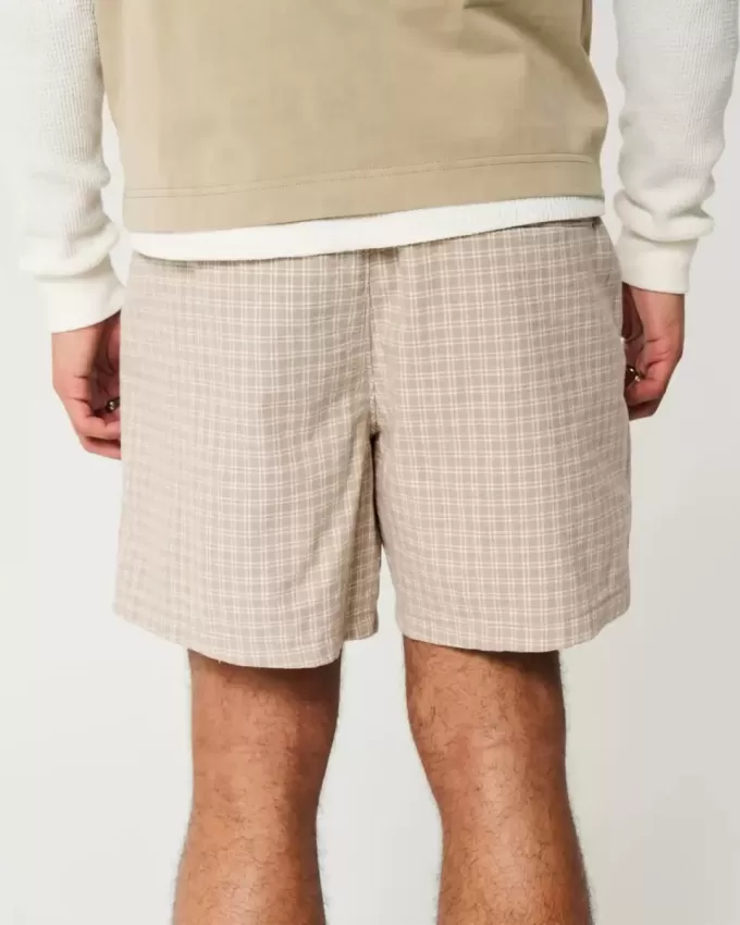 Pantaloncini in misto lino a metà coscia
