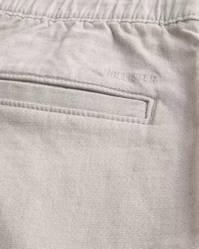 Pantaloncini in misto lino con parte anteriore piatta fino al ginocchio