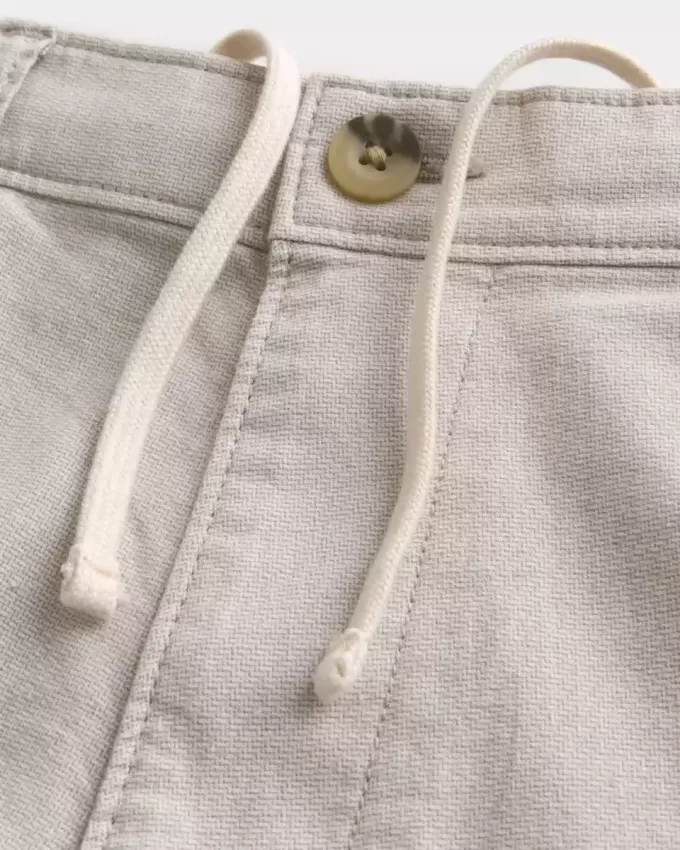 Pantaloncini in misto lino con parte anteriore piatta fino al ginocchio