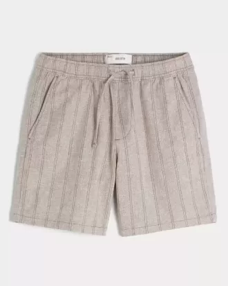 Pantaloncini in misto lino sopra il ginocchio