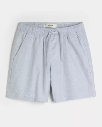 Pantaloncini in misto lino sopra il ginocchio