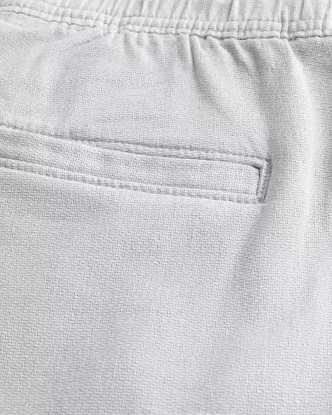 Pantaloncini in misto lino sopra il ginocchio