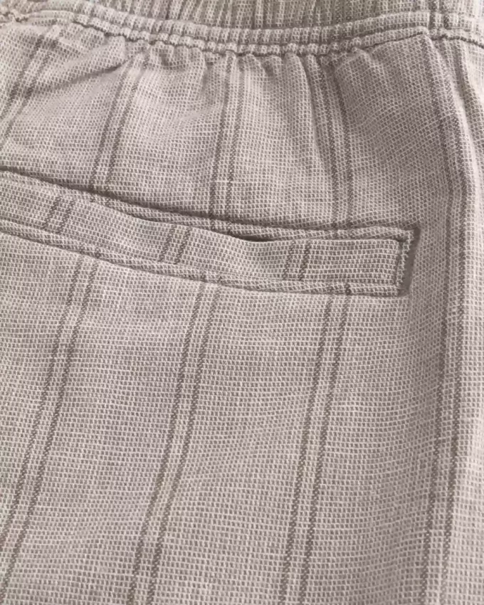 Pantaloncini in misto lino sopra il ginocchio