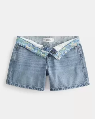 Pantaloncini larghi in denim a vita bassa con risvolto e lavaggio medio, 5″