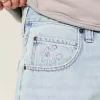 Pantaloncini larghi in denim con grafica a stella