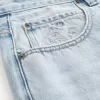 Pantaloncini larghi in denim con grafica a stella