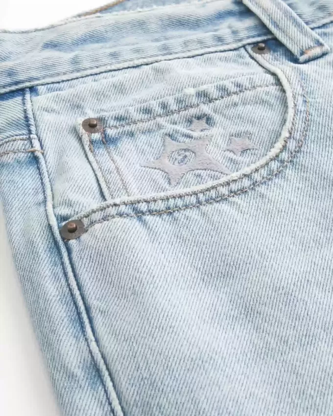 Pantaloncini larghi in denim con grafica a stella