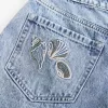 Pantaloncini larghi in denim con ricamo a conchiglia, lavaggio medio, a vita alta, 5″ Pantaloncini larghi in denim con ricamo a conchiglia, lavaggio medio, a vita alta, 5″