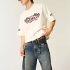 Pantaloncini larghi in denim con stampa serpente