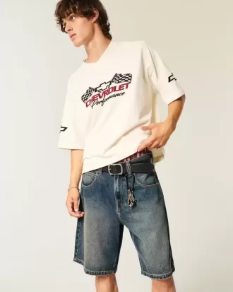 Pantaloncini larghi in denim con stampa serpente