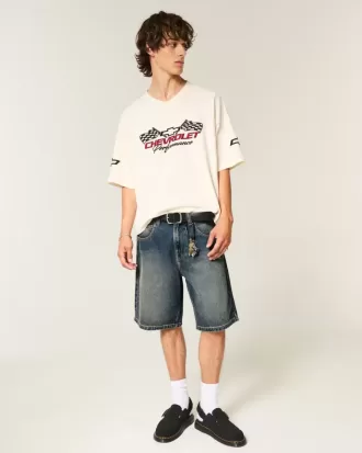 Pantaloncini larghi in denim con stampa serpente