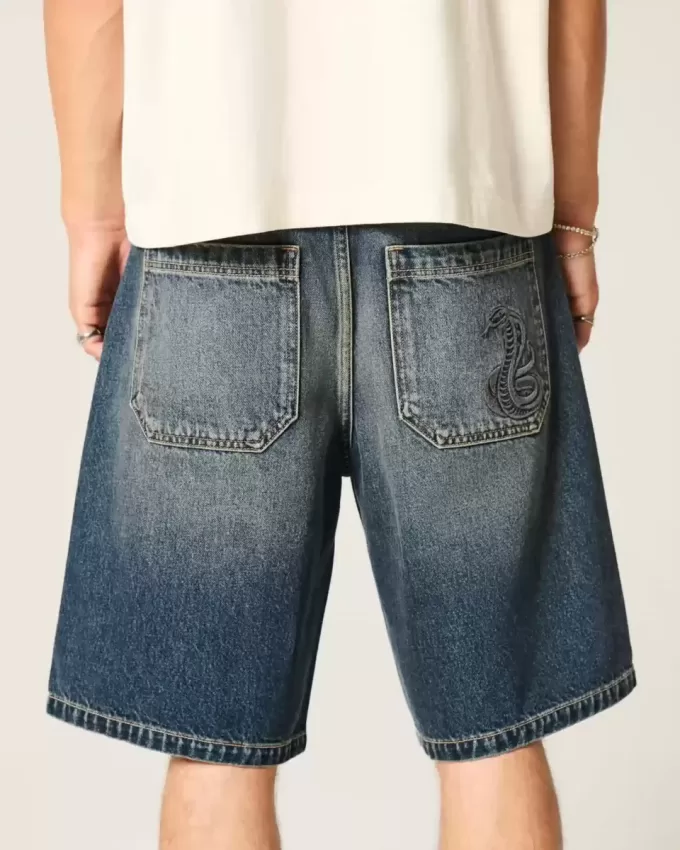 Pantaloncini larghi in denim con stampa serpente