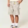 Pantaloncini larghi in denim mimetici