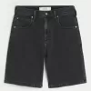 Pantaloncini larghi in denim nero lavato