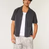 Pantaloncini mimetici larghi in pile a metà coscia