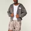 Pantaloncini mimetici larghi in pile a metà coscia