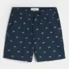 Pantaloncini sopra il ginocchio in misto lino con fantasia