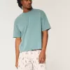 Pantaloncini sopra il ginocchio in misto lino con fantasia