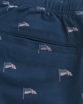 Pantaloncini sopra il ginocchio in misto lino con fantasia