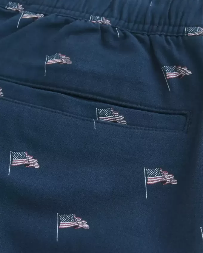 Pantaloncini sopra il ginocchio in misto lino con fantasia