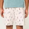 Pantaloncini sopra il ginocchio in misto lino con fantasia