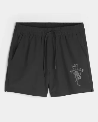 Pantaloncini sportivi con grafica a metà coscia
