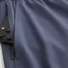 Pantaloncini sportivi con grafica a metà coscia