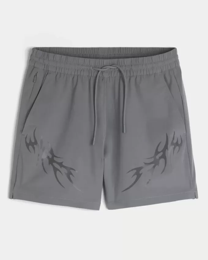 Pantaloncini sportivi con grafica a metà coscia