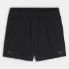 Pantaloncini sportivi con logo a metà coscia
