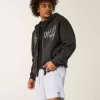 Pantaloncini sportivi con logo a metà coscia