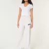 Pantaloni a gamba larga in pile con grafica NYC Pantaloni a gamba larga in pile con grafica NYC