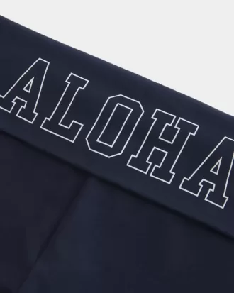 Pantaloni a zampa con vita ripiegata e grafica Aloha