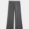 Pantaloni a zampa in maglia con risvolto in vita
