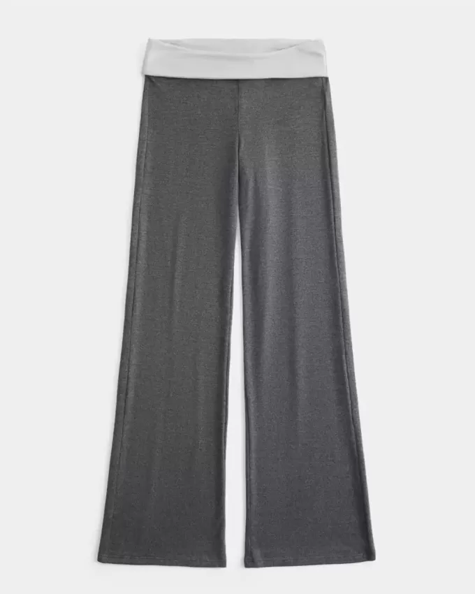 Pantaloni a zampa in maglia con risvolto in vita