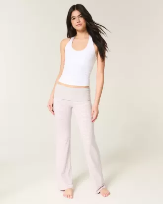 Pantaloni a zampa in maglia con risvolto in vita