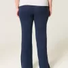 Pantaloni a zampa in maglia con risvolto in vita