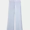 Pantaloni a zampa in maglia con risvolto in vita