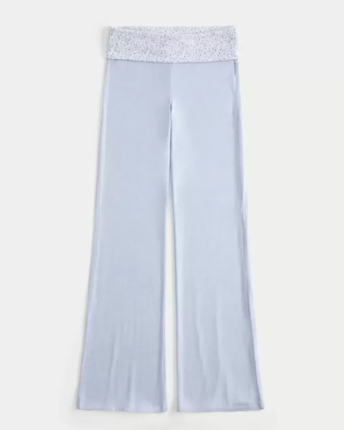 Pantaloni a zampa in maglia con risvolto in vita