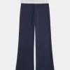 Pantaloni a zampa in maglia con risvolto in vita